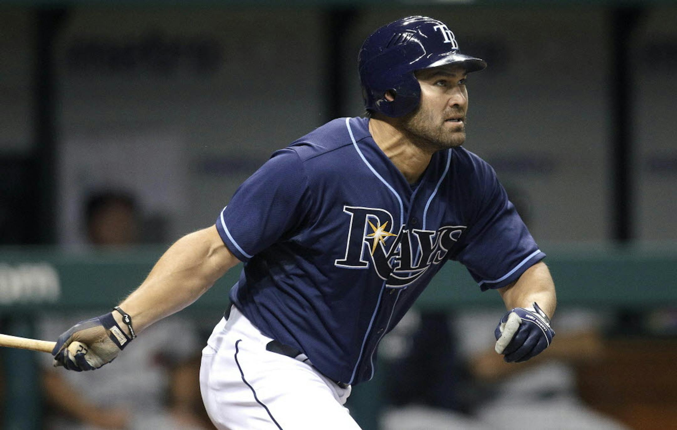Tampa Bay's Johnny Damon watches is 10th-inning, two-run home run off Minnesota relief pitcher Matt Capps.