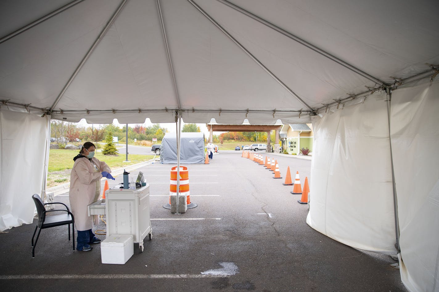 Cheryl Odegaard, a medical assistant at St. Luke's Respiratory Clinic, prepared to administer COVID-19 tests to patients in their drive thru testing site on Thursday. ] ALEX KORMANN • alex.kormann@startribune.com St. Luke's Respiratory Clinic administers an average of 50 COVID-19 tests each day. The testing site saw around that number on Thursday September 24, 2020.