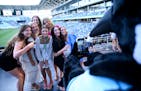 The Wayzata volleyball team poses for a photo taken by Loons mascot "PK" before the start of the Star Tribune's All-Metro Sports Awards gala Wednesday