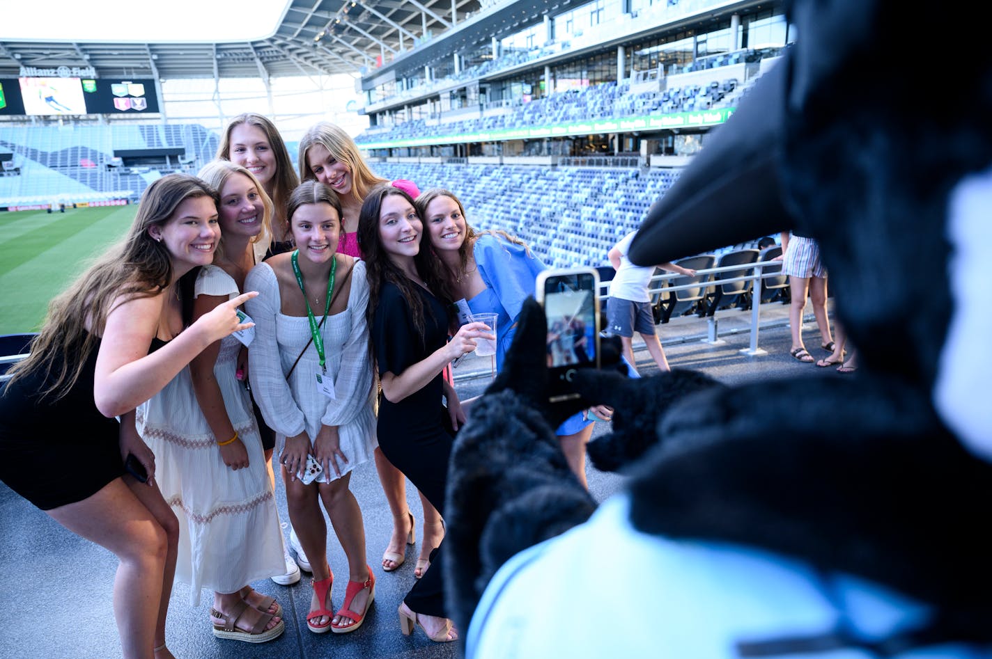 The Wayzata volleyball team poses for a photo taken by Loons mascot "PK" before the start of the Star Tribune's All-Metro Sports Awards gala Wednesday, July 27, 2022 at Allianz Field in St. Paul, Minn.] aaron.lavinsky@startribune.com