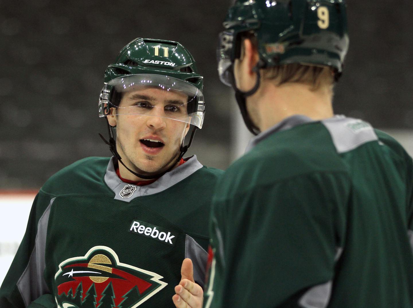 Mikko Koivu's relationship with Zachi Parise (pictured, left) and Ryan Suter, who signed free-agent 13-year deals in 2012, has evolved.