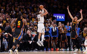 Denver Nuggets forward Aaron Gordon (32) sinks a go-ahead three-pointer in the final seconds of Game 1 as the Oklahoma City Thunder's Chet Holmgren (7