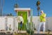 Artist Josh Agle (aka Shag) on right, and Brandon McBurney outside McBurney's home in Palm Springs, Calif. 