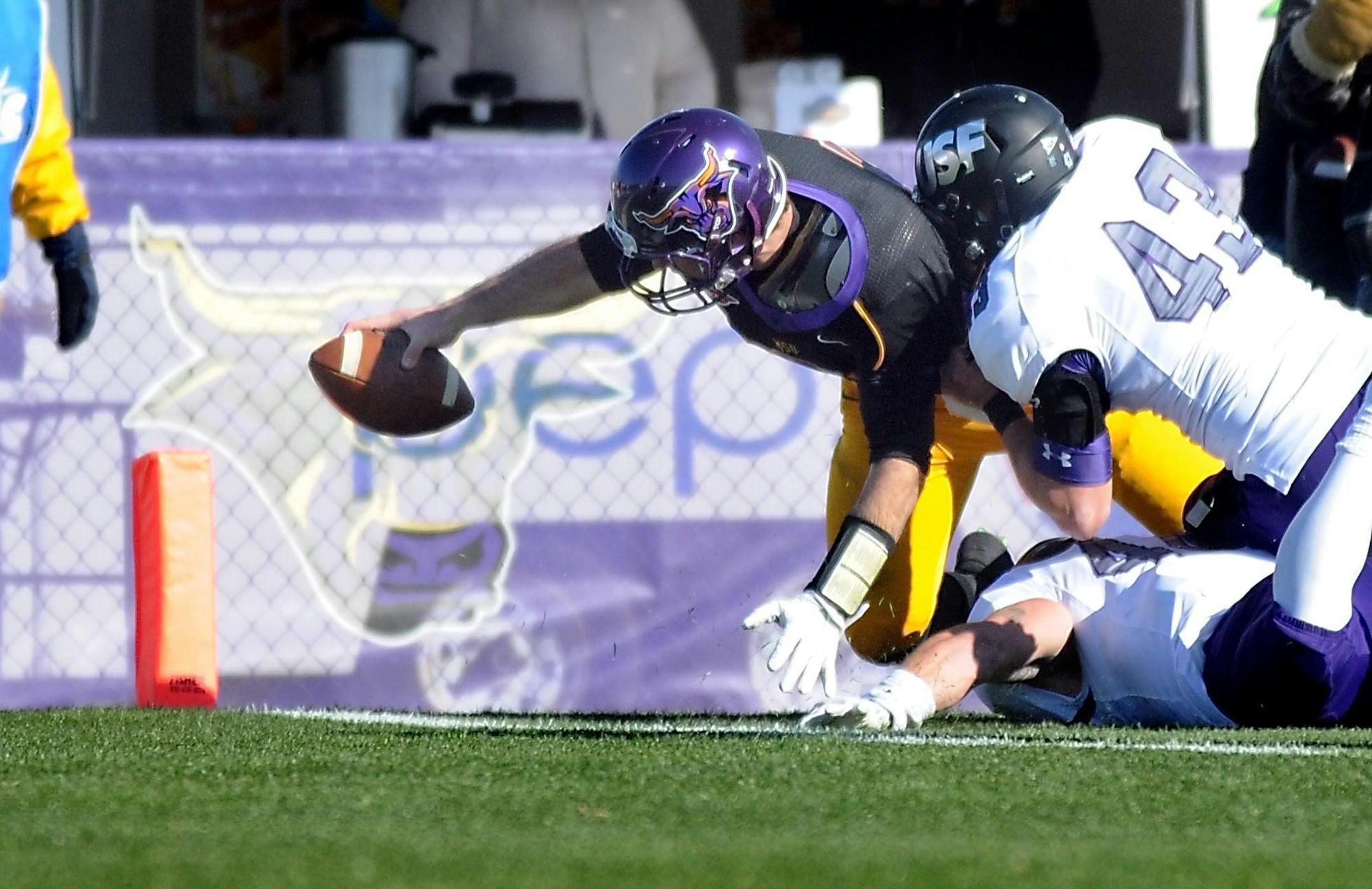 Minnesota State University, Mankato quarterback Nick Pieruccini dives for the end zone for a touchdown during the first half Saturday against the University of Sioux Falls at Blakeslee Stadium in Mankato. Photo by Pat Christman/Mankato Free Press