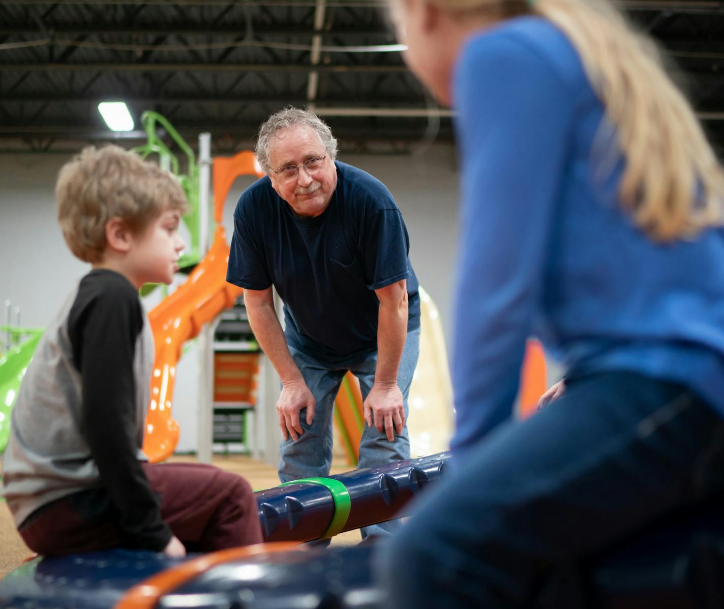 John Olson checked on his grandson Alek, 6, and granddaughter Danika, 7, on a ride at Good Times Park in Eagan. Good Times Park a huge indoor park with controlled access. It is a staffless park that requires adults to supervise the children them bring themselves.