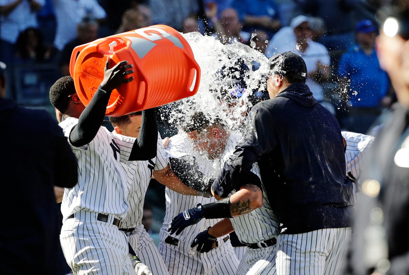 New York Yankees' Gary Sanchez, center, celebrates with teammates after hitting a game-winning three-run home run vs. the Twins on Thursday.