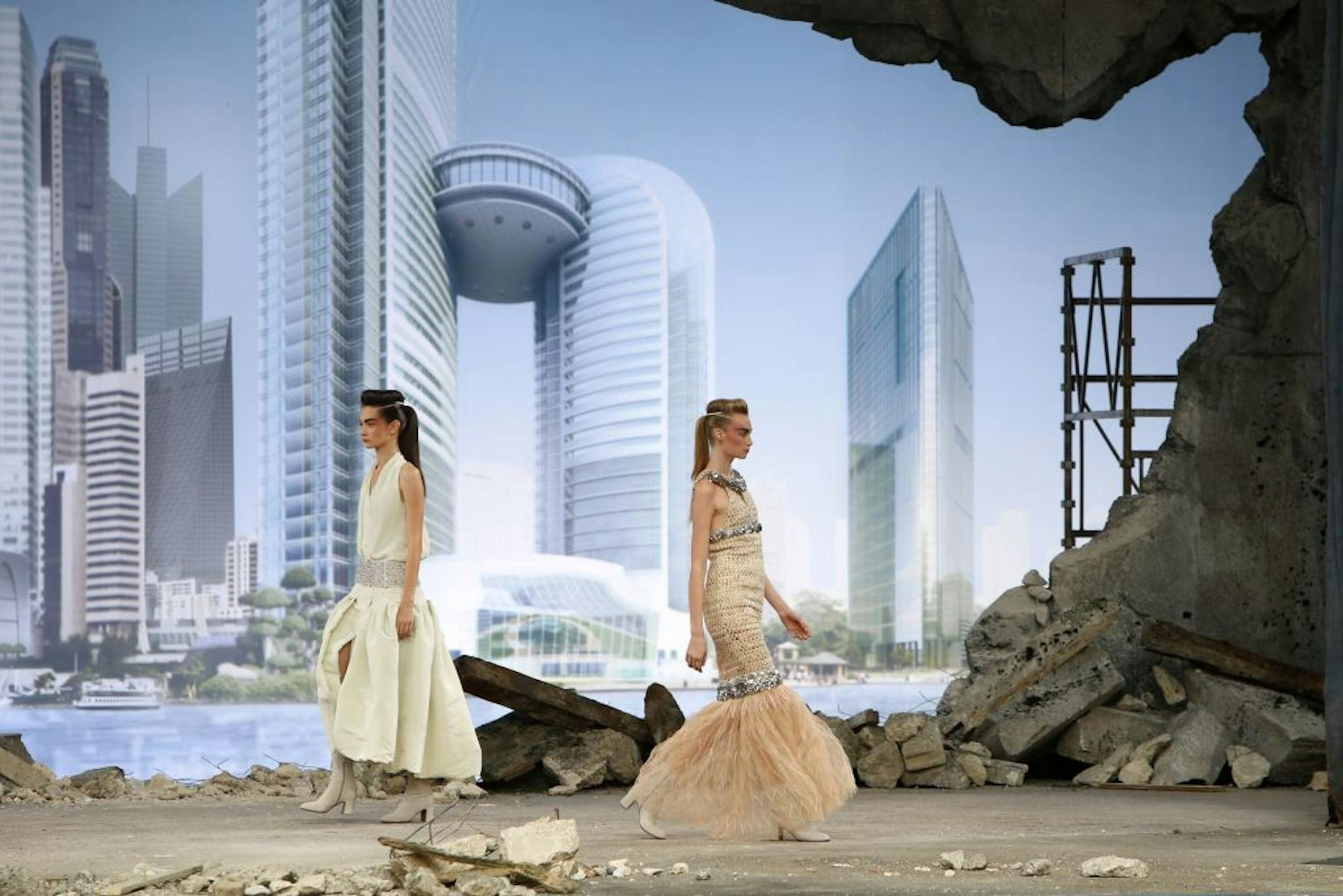 Models wear creations by German fashion designer Karl Lagerfeld for Chanel's Haute Couture Fall-Winter 2013-2014 collection, presented Tuesday, July 2, 2013 in Paris.