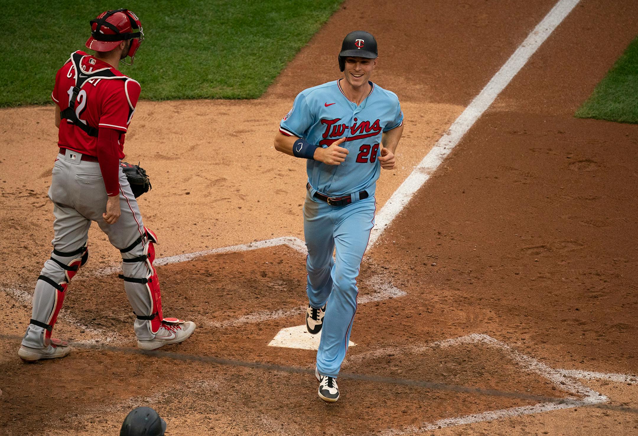 Minnesota Twins right fielder Max Kepler (26) was all smiles as he scored in the sixth inning on a sacrifice fly by left fielder Eddie Rosario.