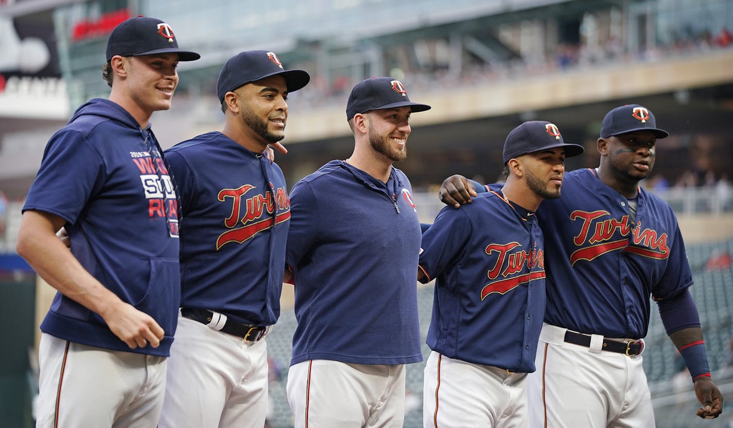 The five Minnesota Twins players with 30 plus home runs in the season are honored before the game. From left is Max Kepler, Nelson Cruz, Mitch Garver, Eddie Rosario and Miguel Sano. ] LEILA NAVIDI &#x2022; leila.navidi@startribune.com BACKGROUND INFORMATION: The Minnesota Twins play the Chicago White Sox at Target Field in Minneapolis on Wednesday, September 18, 2019.