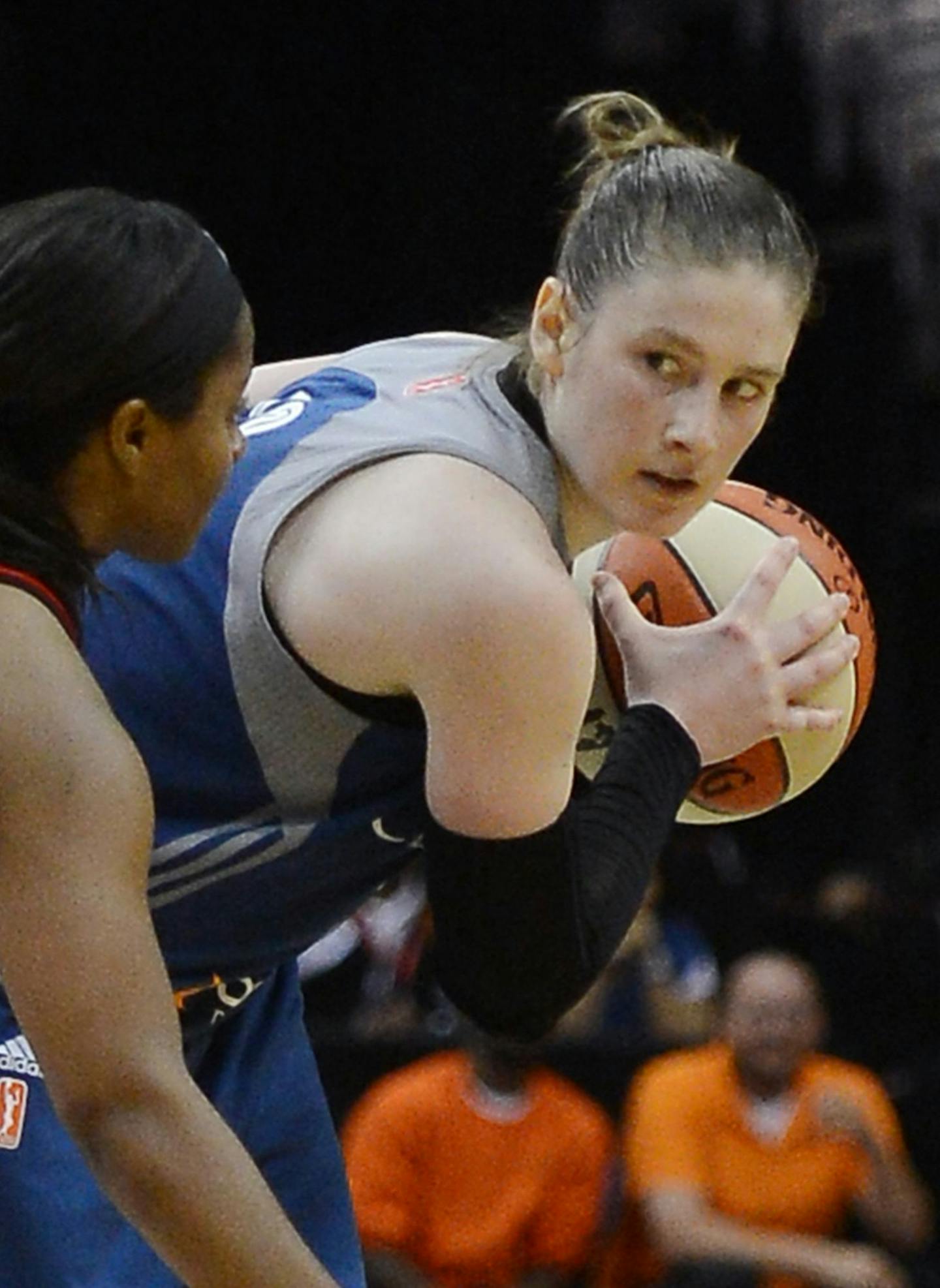 Minnesota Lynx guard Lindsay Whalen (13) protects the ball against Washington Mystics guard Ivory Latta (12) in the fourth quarter at the Verizon Center in Washington, D.C., Friday, May 16, 2014. The Lynx defeated the Mystics, 89-77. (Chuck Myers/MCT) ORG XMIT: 1152999 ORG XMIT: MIN1405162034230460