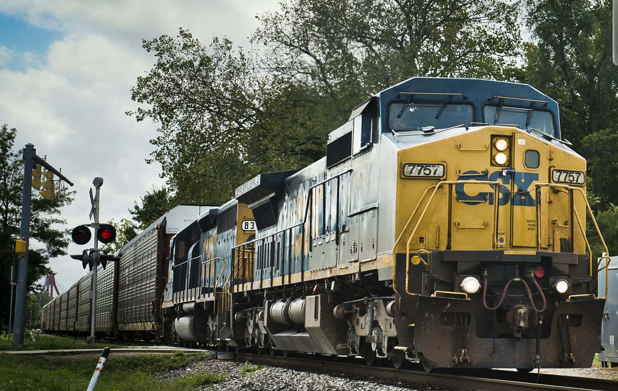 A Louisville & Indiana Railroad train passes through town Monday, Sept., 2014, in Columbus, Ind. Officials expect a decision soon from federal regulators regarding plans for upgrading more than 100 miles of railroad tracks through southern Indiana. The proposal from Louisville & Indiana Railroad and CSX Transportation would allow the line between Indianapolis and Louisville, Kentucky, to handle larger and faster freight trains. (AP Photo/The Republic, Andrew Laker) ORG XMIT: MIN2014101616282944