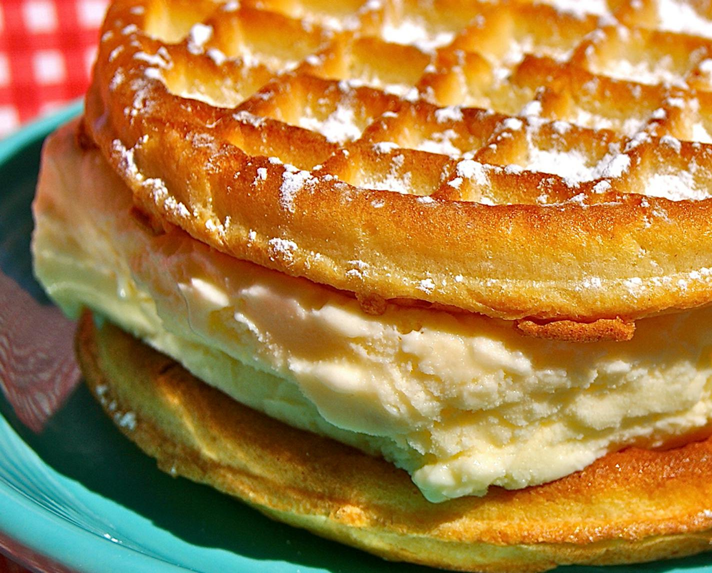 Hot Toasted Waffle Ice Cream Sandwich Two hot, crunchy, toasted waffles sandwich a wedge of rich vanilla ice cream with a light powdered sugar dusting &#x201a;&#xc4;&#xee; it&#x201a;&#xc4;&#xf4;s hot, cold and crunchy. Provided by the Minnesota State Fair ORG XMIT: MIN1406251628494185