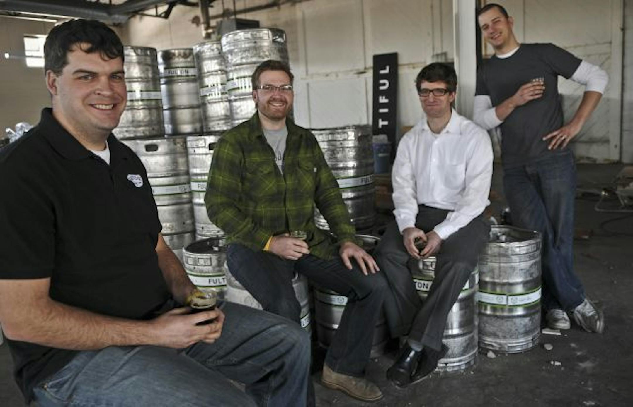Ryan Petz and his three partners, from left, Jim Diley, Peter Grande and Brian Huffman started the Fulton Brewery in a garage in south Minneapolis. Now, they're in the final stages of renovating a space near Target Field.
