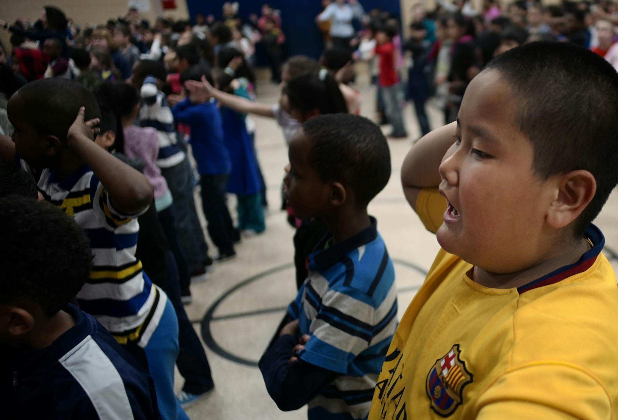 Jalue Dorjee,9, enjoyed an assembly at school in Columbia Heights.