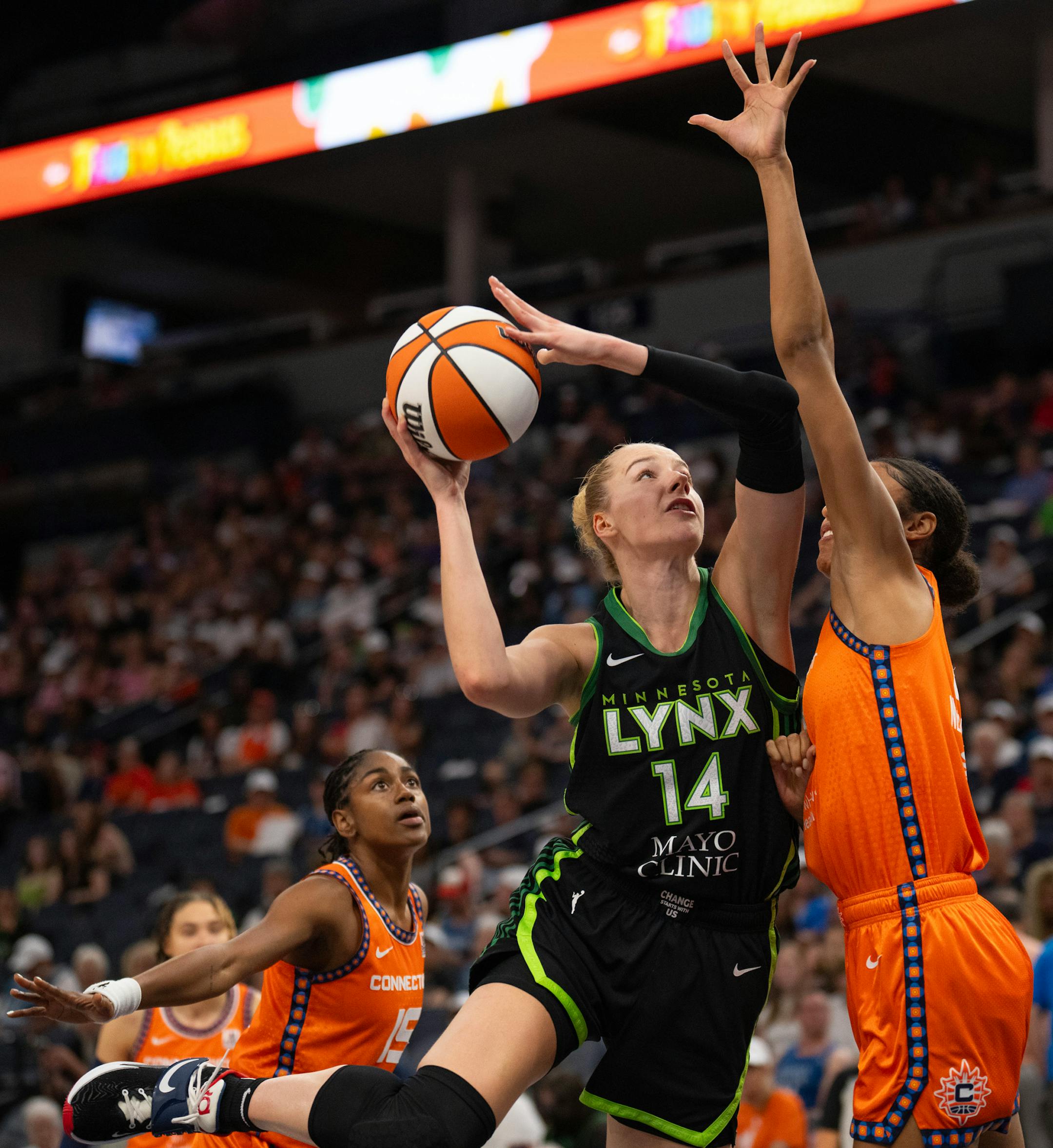 Minnesota Lynx forward Dorka Juhasz (14) shot while defended by Connecticut Sun forward Olivia Nelson-Ododa (10) in the first quarter Thursday night. The Minnesota Lynx faced the Connecticut Sun in a WNBA game Thursday night, June 22, 2023 at Target Center in Minneapolis.