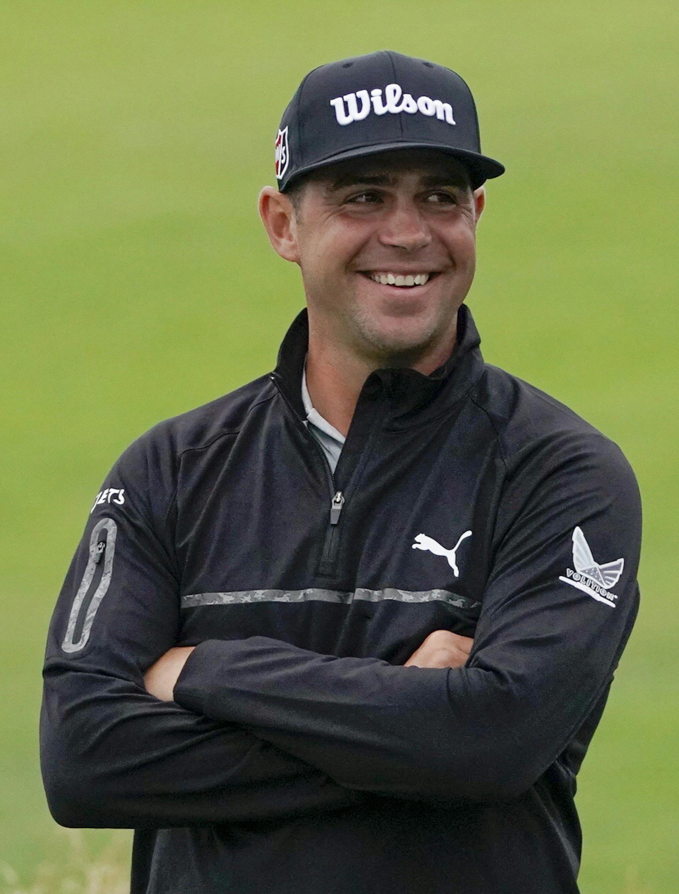 Gary Woodland smiles after finishing the second round in the U.S. Open golf tournament Friday, June 14, 2019, in Pebble Beach, Calif. (AP Photo/Carolyn Kaster)