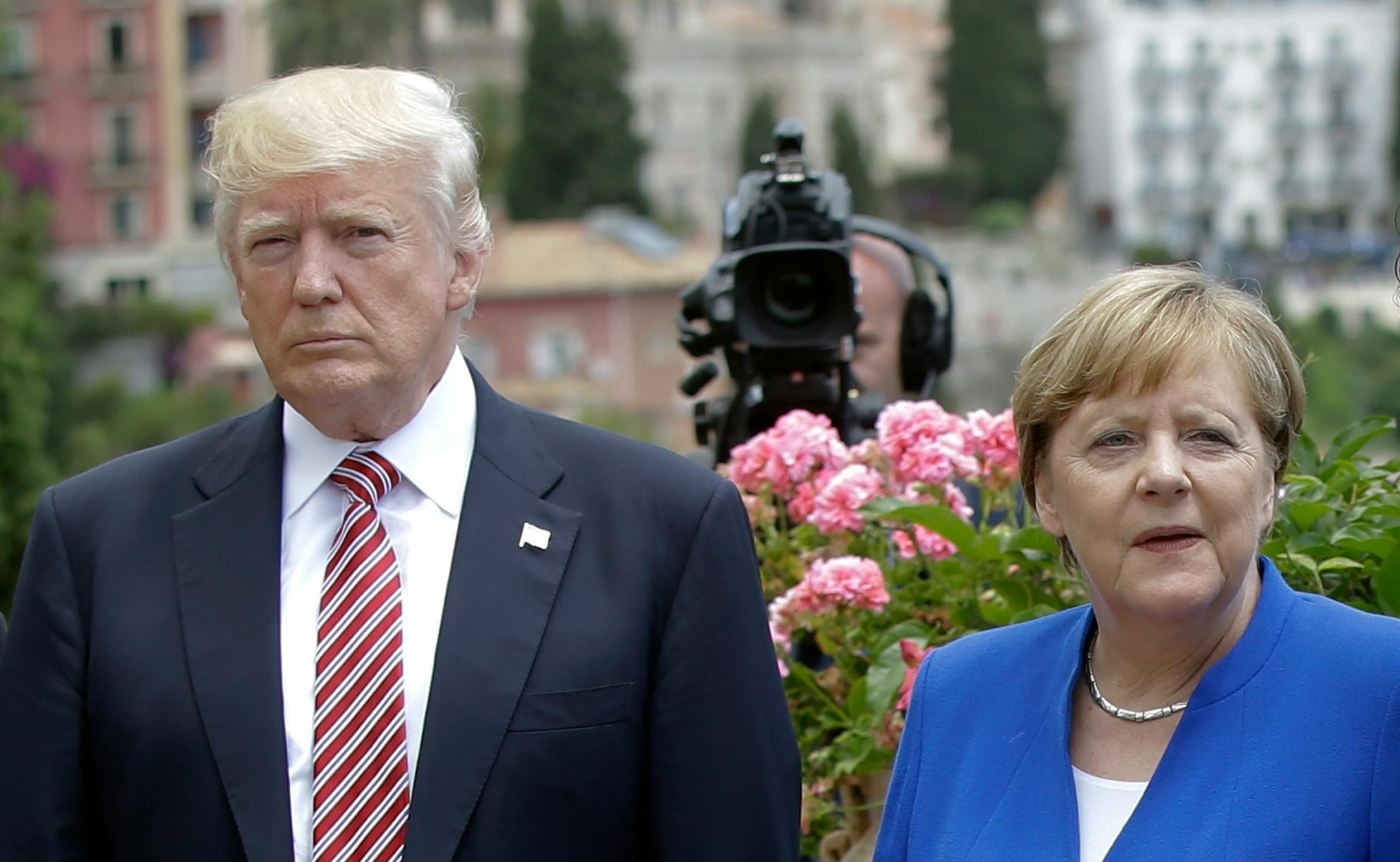President Trump was flanked by German Chancellor Angela Merkel during the G7 meeting in Taormina, Italy, on May 26. The strains in the U.S.-German relationship were apparent on their faces.