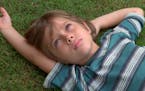 This image released by IFC Films shows Ellar Coltrane at age six in a scene from the film,"Boyhood." The film is nominated for an Oscar Award for best