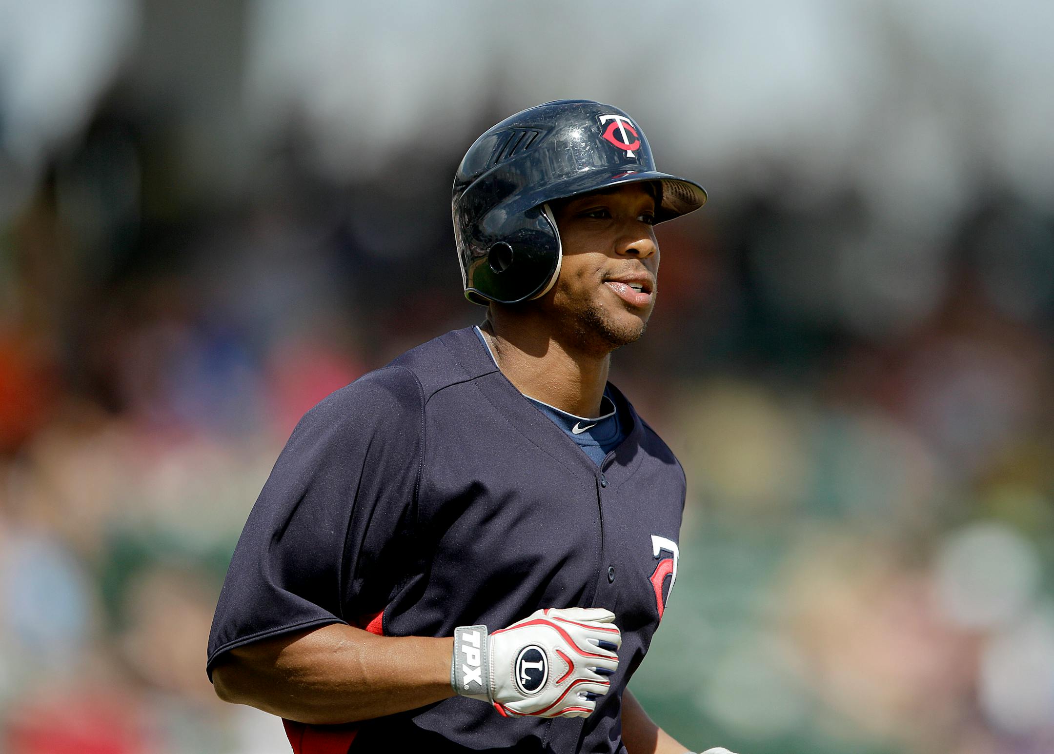 Minnesota Twins center fielder Ben Revere plays in a spring training baseball game against the Baltimore Orioles Wednesday, March 7, 2012, in Sarasota, Fla. Baltimore won 6-0. (AP Photo/David Goldman)