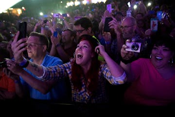 Michelle Johnson shouted in excitement as Culture Club took the stage at Myth Nightclub on Sunday, July 24, 2016.