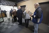 Joe Antonucci waited in line to pre pay his 2018 property tax Wednesday December 27, 2017 in Minneapolis, MN.