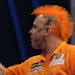 Peter Wright in action at the 'oche', during his match against Andy Hamilton during the World Darts Championship at Alexandra Palace, London, Tuesday 