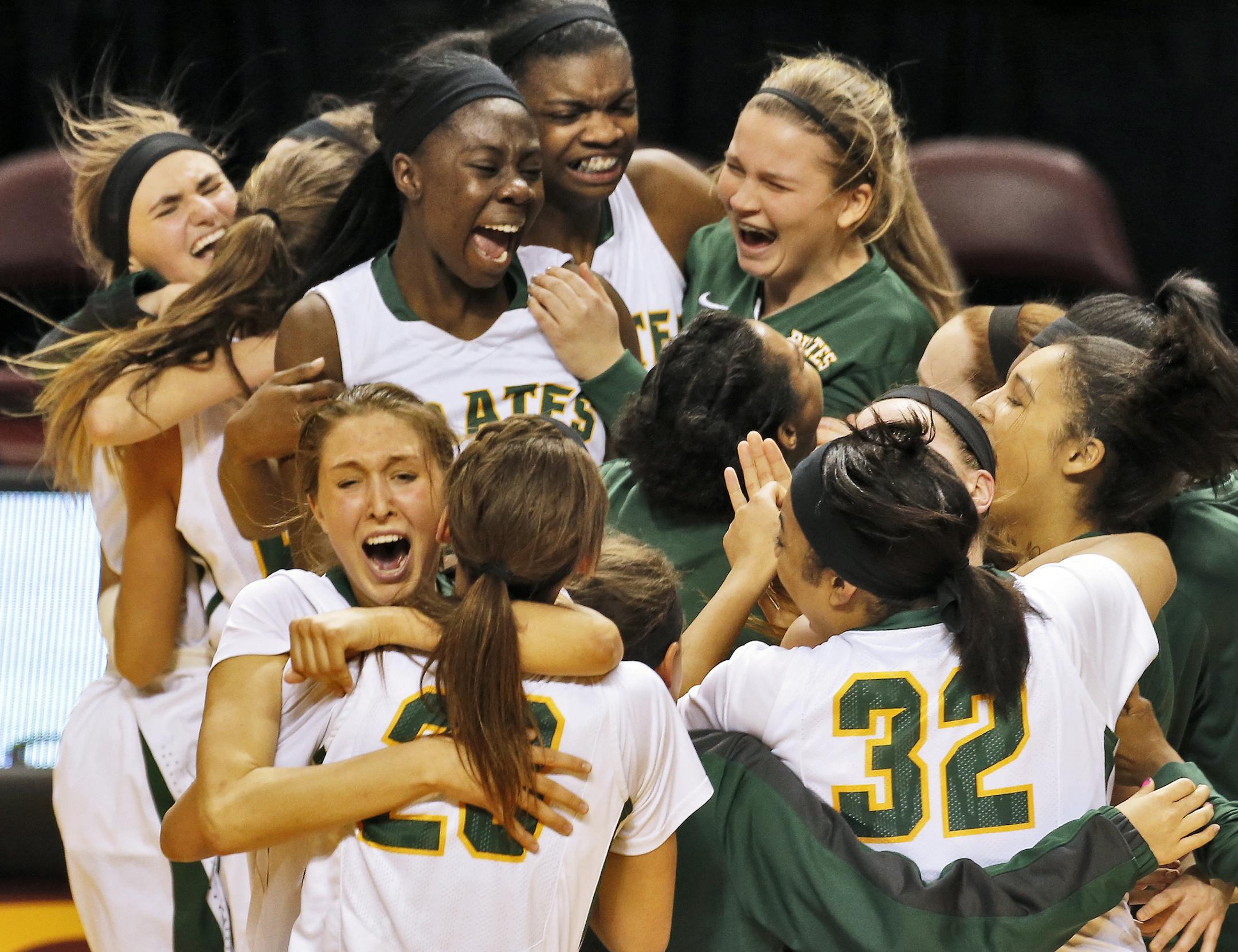 Park Center celebrates. ] Girls Basketball Championship Game - Class 3A - Park Center Pirates vs. Marshall Tigers. Park Center won in three overtime periods 73-71. (MARLIN LEVISON/STARTRIBUNE(mlevison@startribune.com)