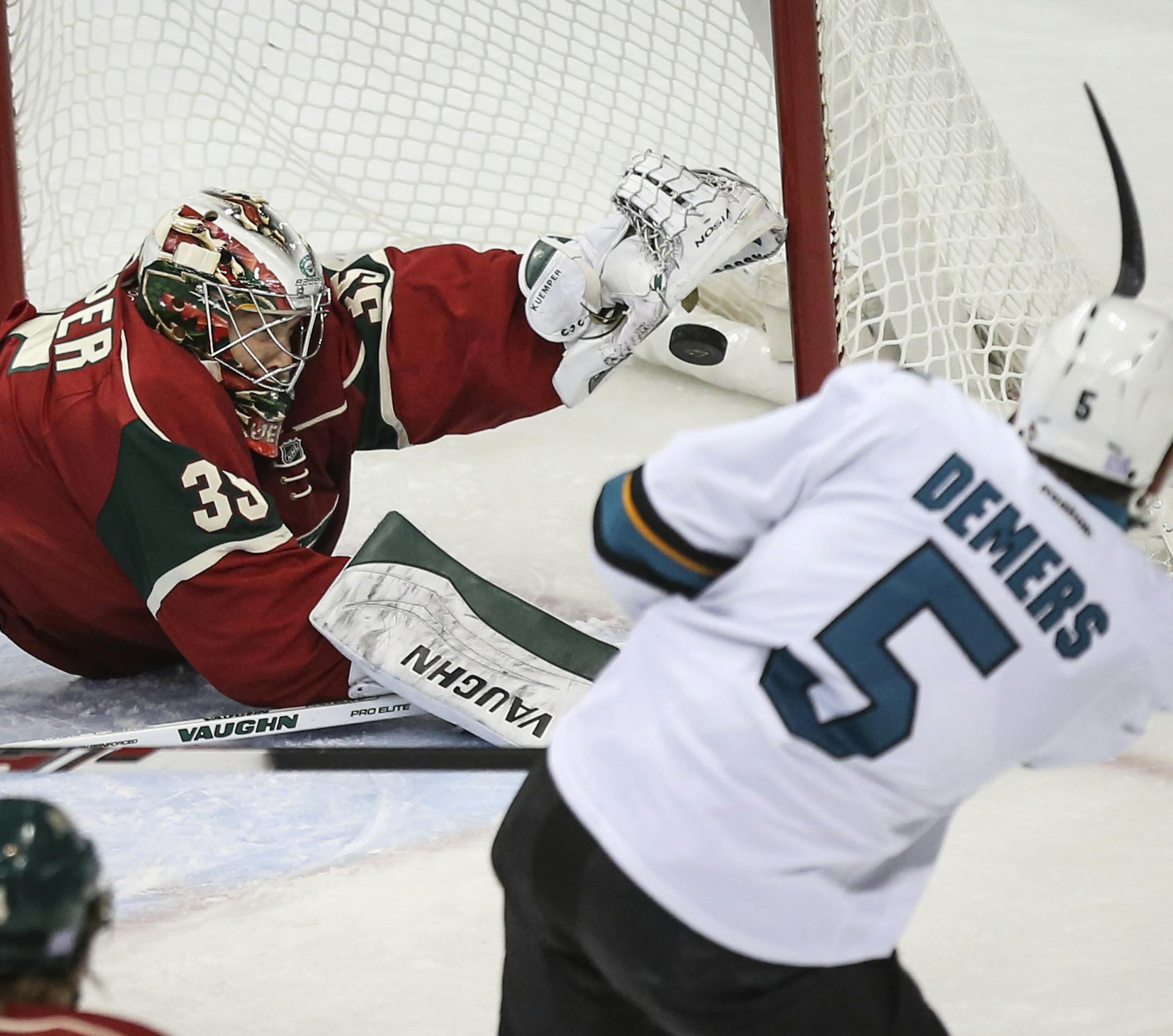 Wild goalie Darcy Kuemper blocked a shot by San Jose's Jason Demers in the first period. The close shot was reviewed and determined goalie interference without a penalty. ] RENEE JONES SCHNEIDER • reneejones@startribune.com The Minnesota Wild vs. the San Jose Sharks at the Xcel Energy Center on Thursday, October 30, 2014 in St. Paul, Minn.