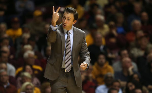 Gophers head coach Richard Pitino gave instructions from the bench during the first half at Williams Arena in Minneapolis, Tuesday, December 3, 2013.