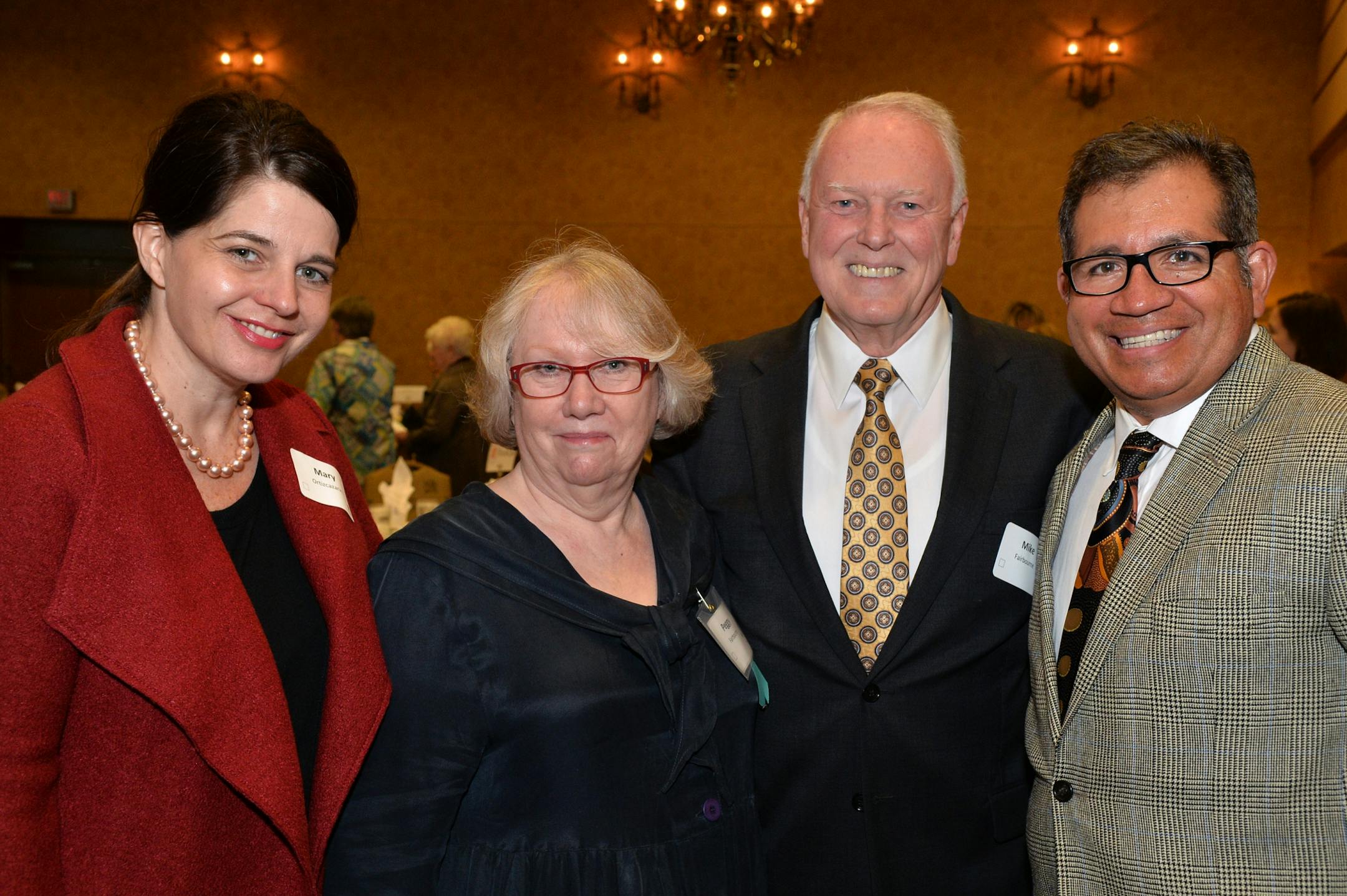 From left, Mary Ortizcazarin, Peggy Fairbourne, former WCCO chief meteorologist and event emcee, Mike Fairbourne, and Ricardo Ortizcazarin.