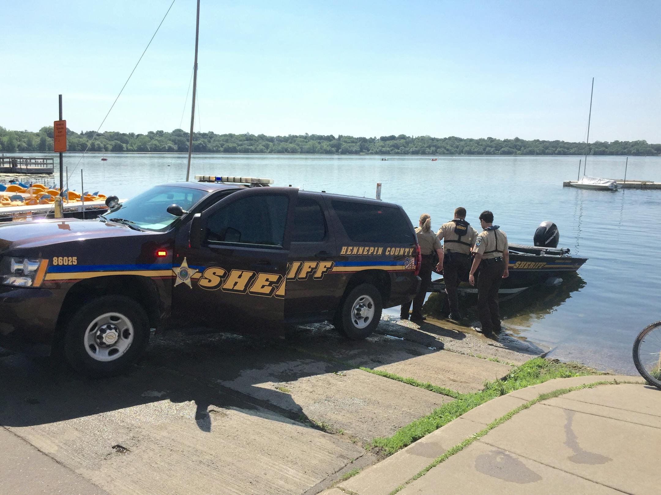 Authorities searched for a missing swimmer Saturday at Lake Harriet in Minneapolis.