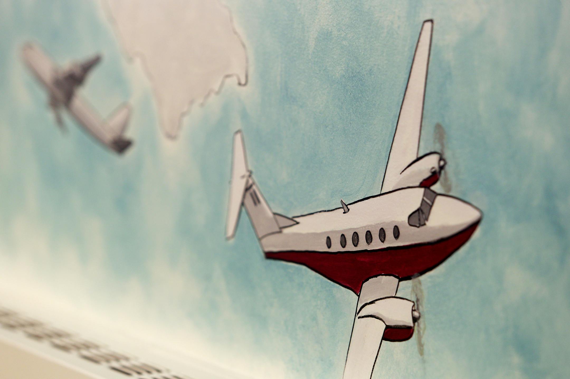 Julie Prairie, a mural artist for the Children's Museum created this wall painting in Wescott Library in Eagan. ] JOELKOYAMA‚Ä¢jkoyama@startribune Minneapolis, MN on May 8, 2014. Julie Prairie, a mural artist for the Children's Museum will do some more painting in Wescott Library in Eagan.