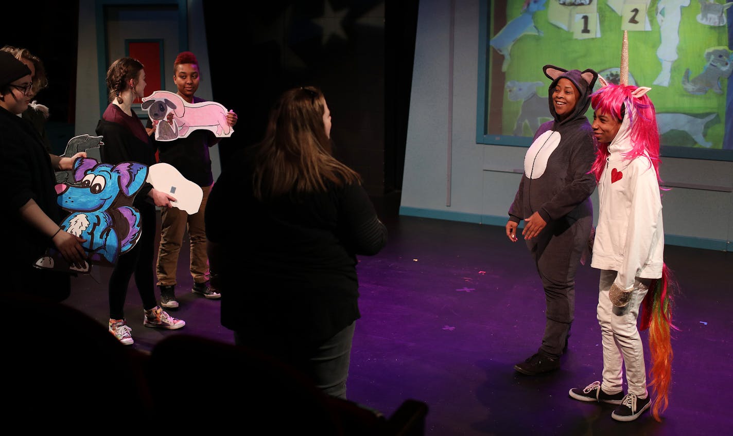 Siddeeqah Shabazz, center, and student Brooklyn (last names withheld) looked to director Stacy Schultz as they worked on rehearsing The Snarky Puppy & The Chicago Avenue Dog Wednesday afternoon. ] ANTHONY SOUFFLE &#xef; anthony.souffle@startribune.com Faye Price and Noel Raymond, co-directors of Pillsbury House Theatre, stood for portraits Wednesday, April 18, 2018 in Minneapolis. Also pictured is a rehearsal for the Chicago Avenue project, in which kids act plays written by professional writers