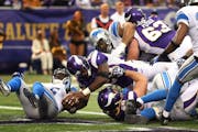 Minnesota Vikings running back Adrian Peterson (28)scored on a two point conversion in the fourth quarter during NFL action between the Detroit Lions 