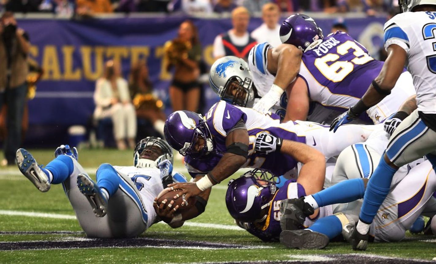 Minnesota Vikings running back Adrian Peterson (28)scored on a two point conversion in the fourth quarter during NFL action between the Detroit Lions and the Minnesota Vikings Sunday Nov.11,2012 at Mall of the America Field in Minneapolis, MN.