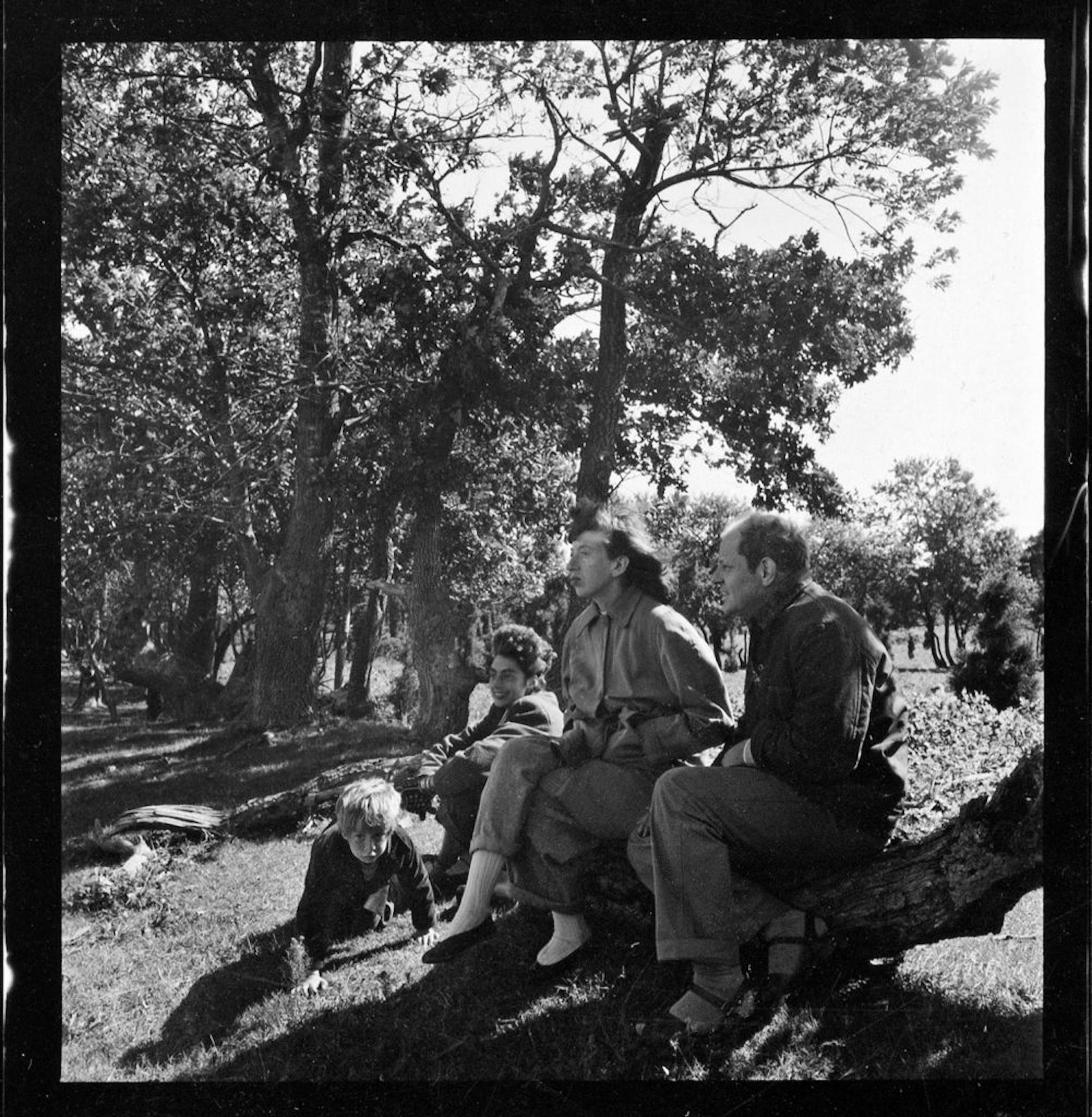 This 1948 photo by Herbert Matter shows Lee Krasner and Jackson Pollack, foreground, with the photographer's children.