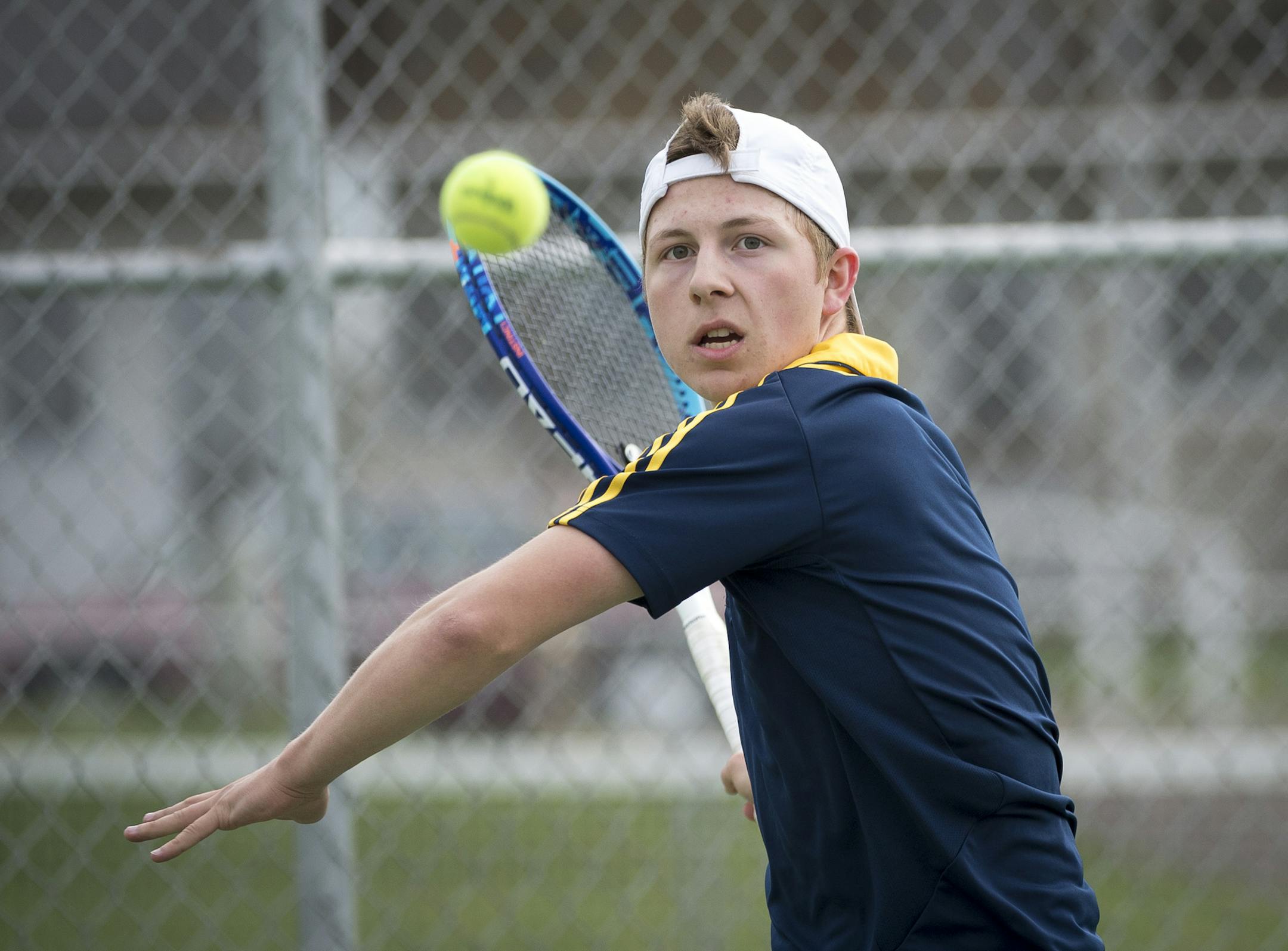 Columbia Heights' Blake Kuether worked on his hitting during a practice on Friday afternoon. ] (Aaron Lavinsky | StarTribune) aaron.lavinsky@startribune.com Blake Kuether, of the Columbia Heights High School Tennis team, practices on Friday, May 1, 2015.