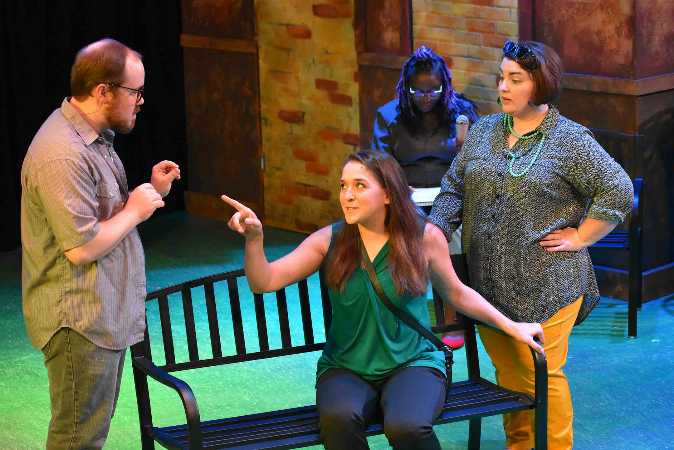 Carl Swanson as Lucas, Kate Beahen as Elizabeth, Atim Opoka (background) and Elinor Strandskov as Kate in "If/Then" at Lyric Arts.