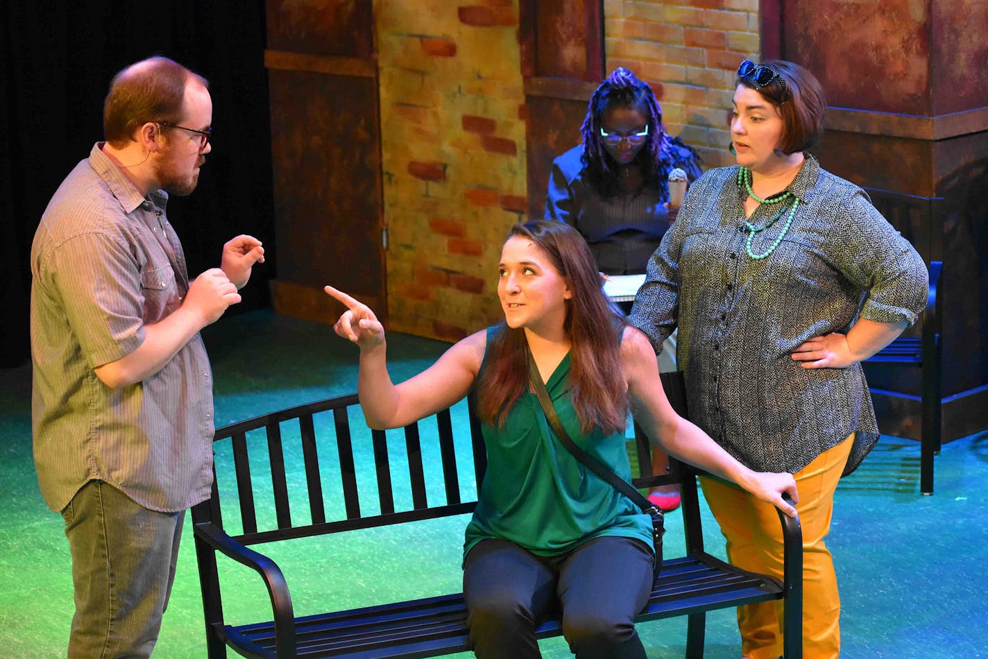 Carl Swanson as Lucas, Kate Beahen as Elizabeth, Atim Opoka (background) and Elinor Strandskov as Kate in "If/Then" at Lyric Arts.