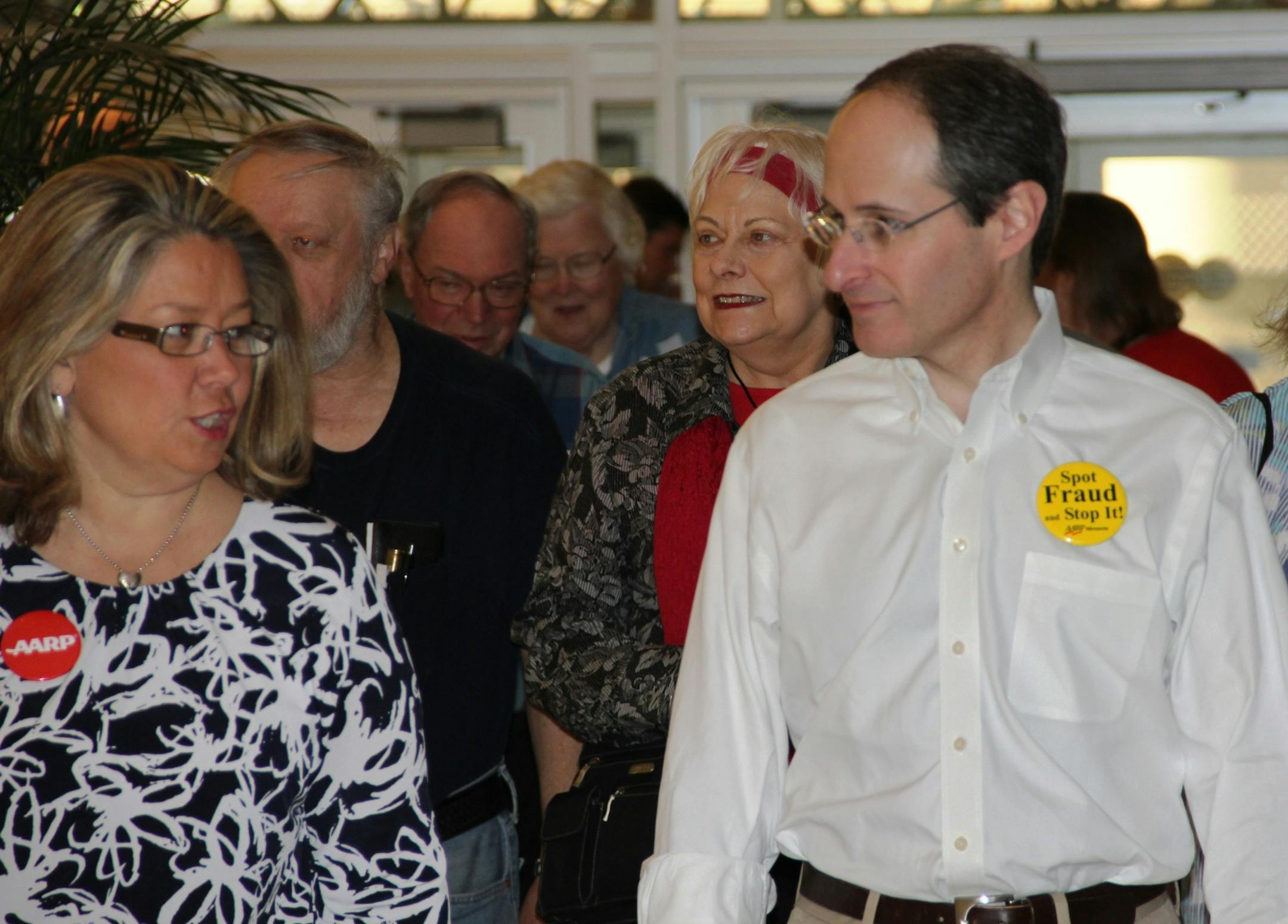 Minnesota Commerce Commissioner Mike Rothman chatted with participants earlier this year at an AARP-sponsored event that focused on elder financial exploitation.