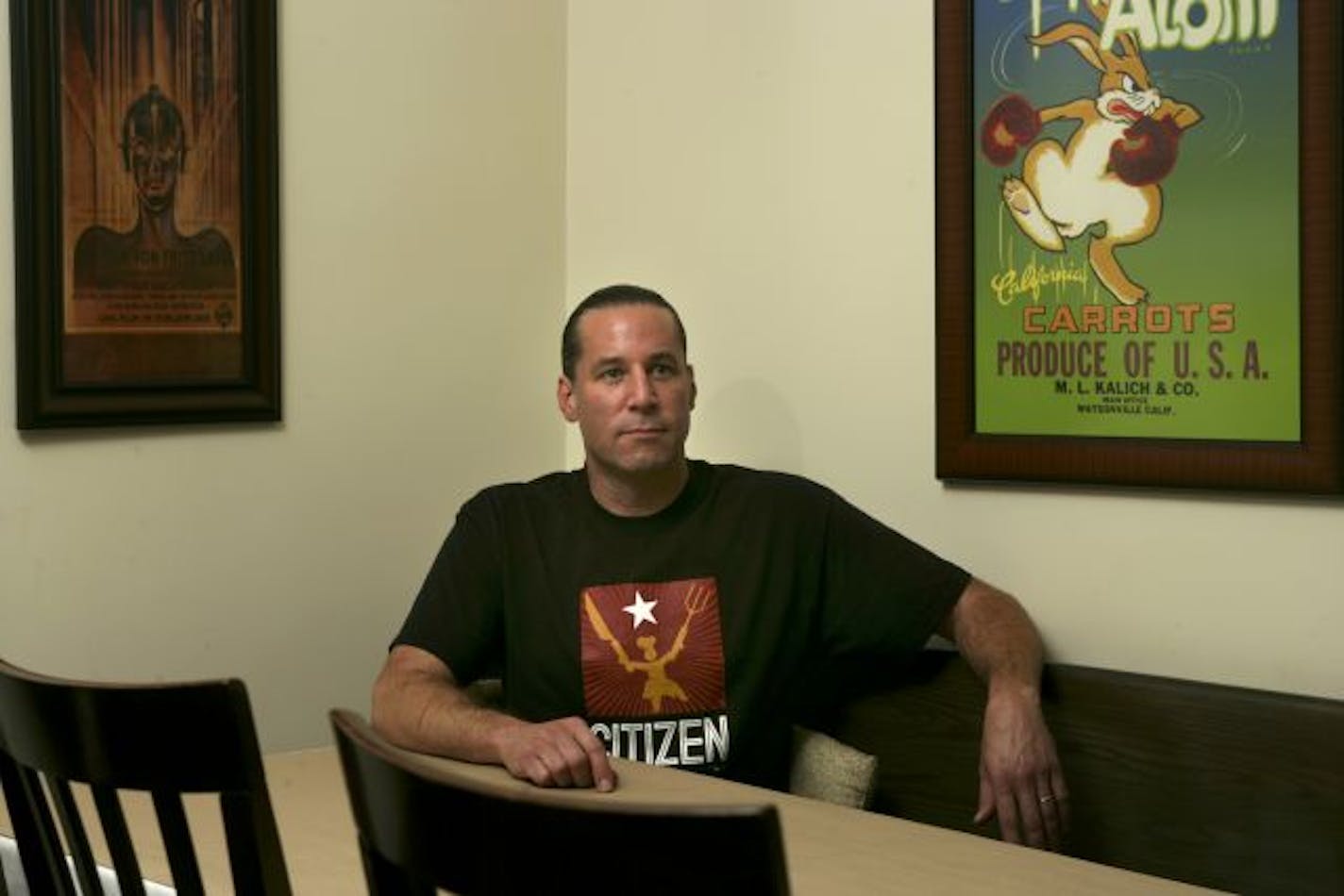 Citizen Cafe owner Michael MacKay in the dining room of his south Minneapolis restaurant.