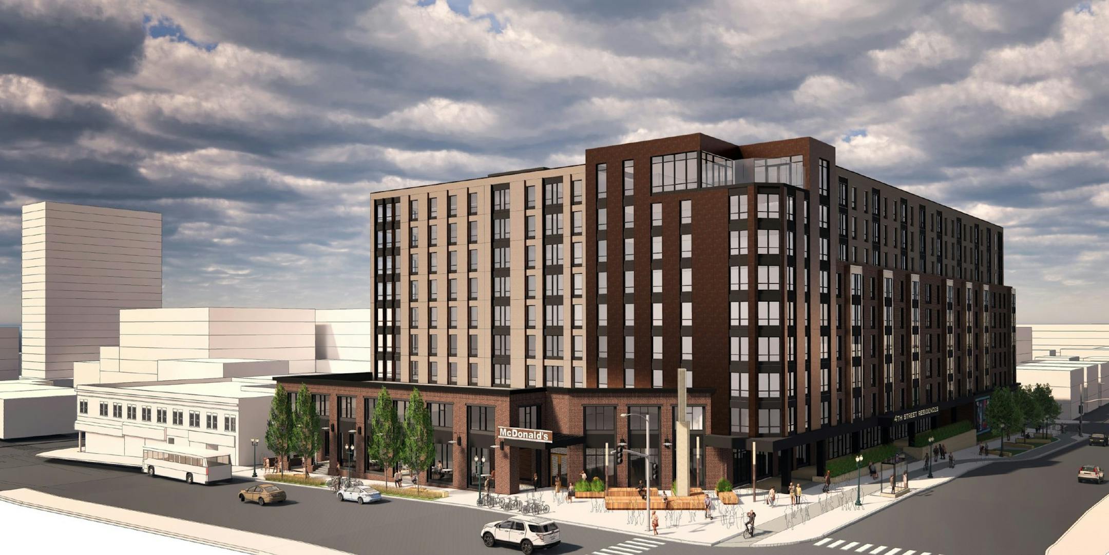 A rendering of an apartment development in Dinkytown that has been downsized from an original proposal of 25 stories. (Rendering: ESG)
