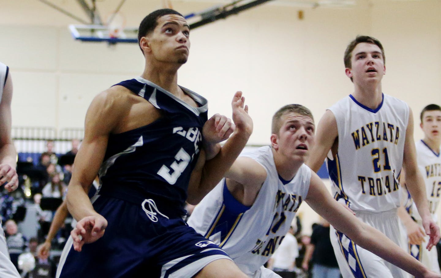 Champlin Park High's Theo John (3) battles for position under the board during the first half against Wayzata High's Austin Slater in the Class 4A, Section 5 boys' basketball section final at Rogers High School Friday, March 6, 2015, in Rogers, MN.](DAVID JOLES/STARTRIBUNE)djoles@startribune.com Class 4A, Section 5 boys' basketball section final at Roger High School Friday, March 6, 2015, in Rogers, MN.