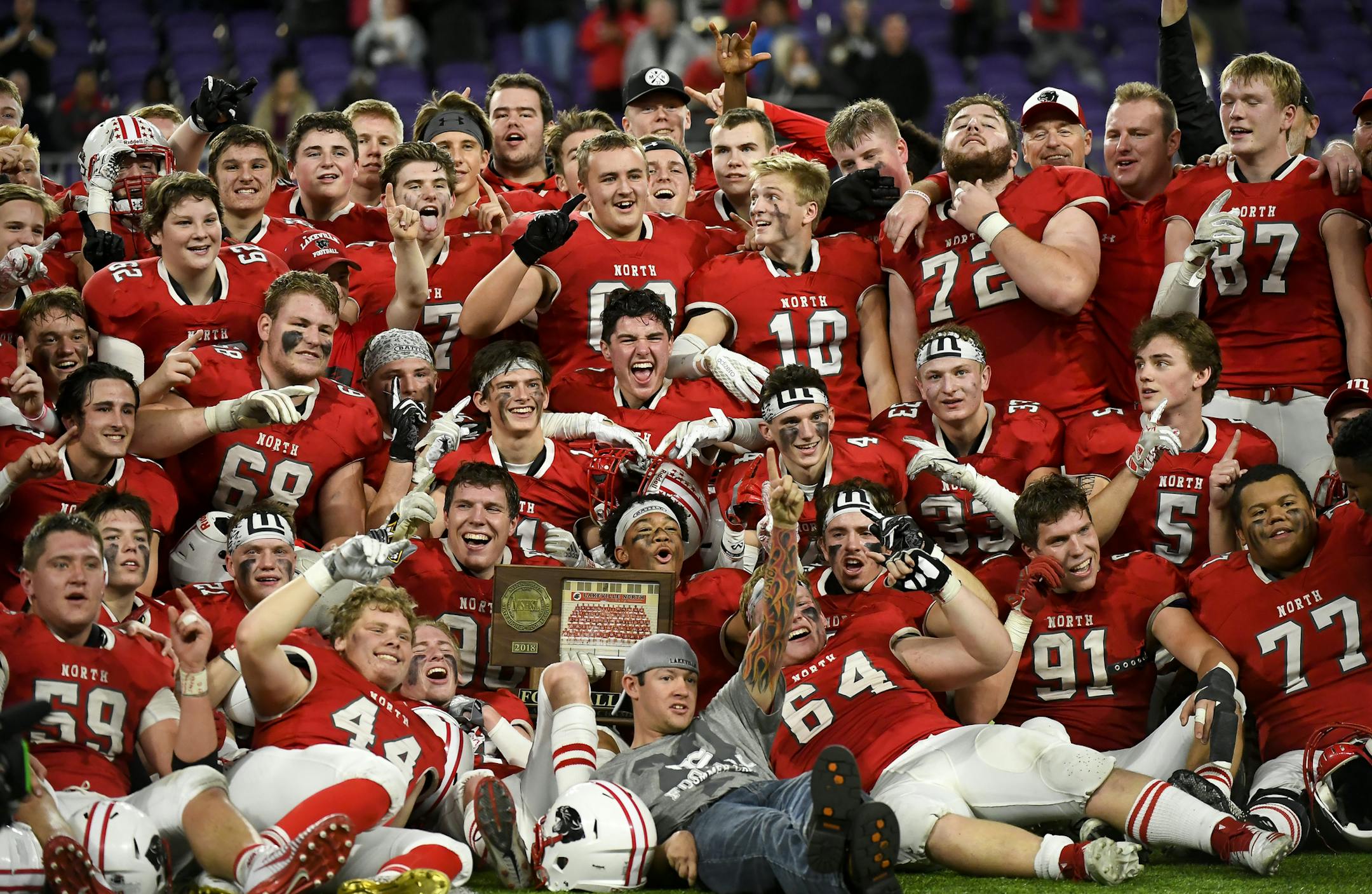 Lakeville North celebrated with their 6A championship trophy after defeating Eden Prairie 28-21 Friday night. ] Aaron Lavinsky &#xa5; aaron.lavinsky@startribune.com Eden Prairie played Lakeville North in the Class 6A state tournament championship football game on Friday, Nov. 23, 2018 at US Bank Stadium in Minneapolis, Minn.