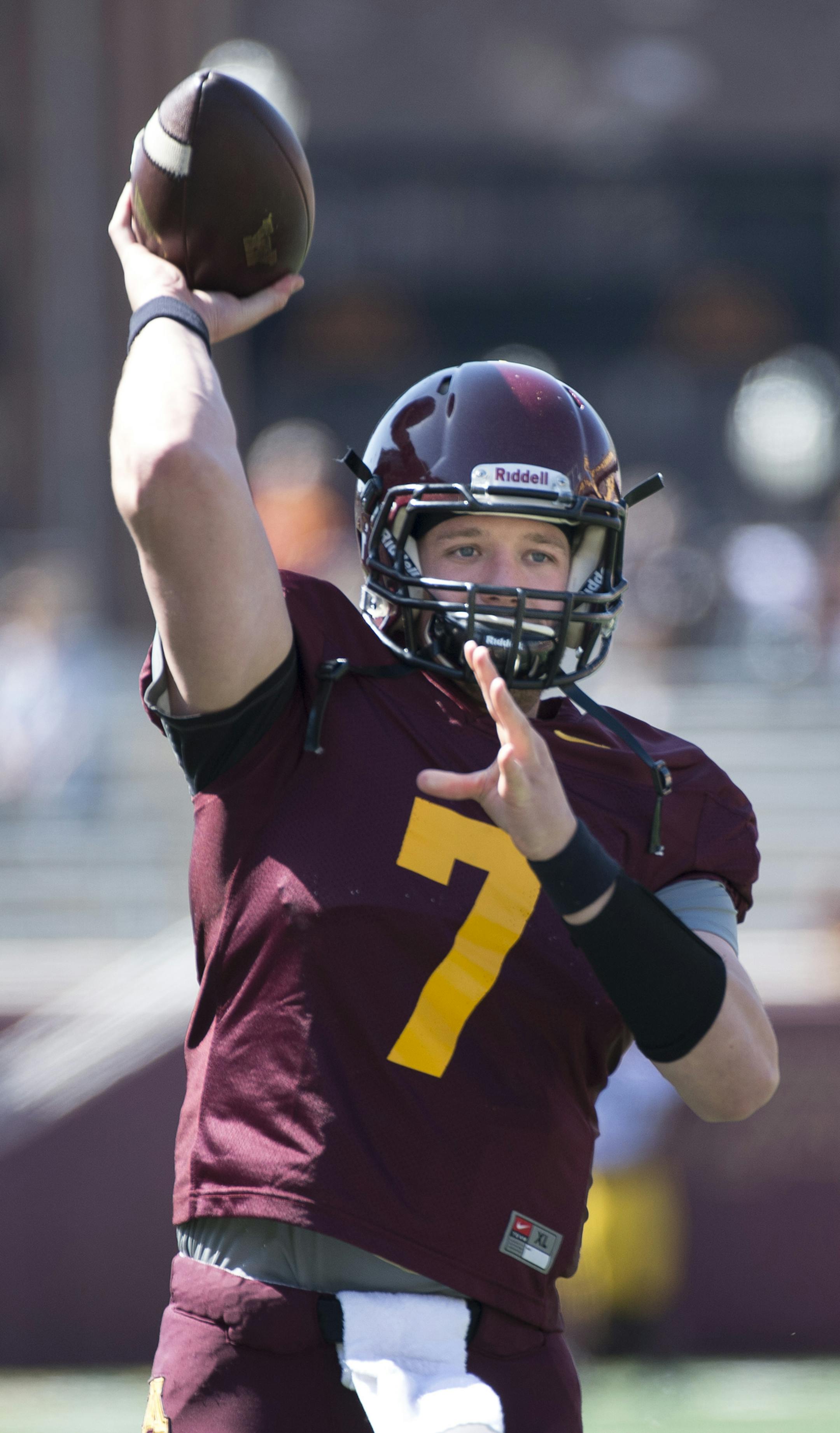 University of Minnesota quarterback Mitch Leidner (7) throws a pass while warming up for Saturday's spring game. ] (Aaron Lavinsky | StarTribune) aaron.lavinsky@startribune.com The University of Minnesota football team participates in its annual spring game on Saturday, April 11, 2015 at TCF Bank Stadium in Minneapolis.