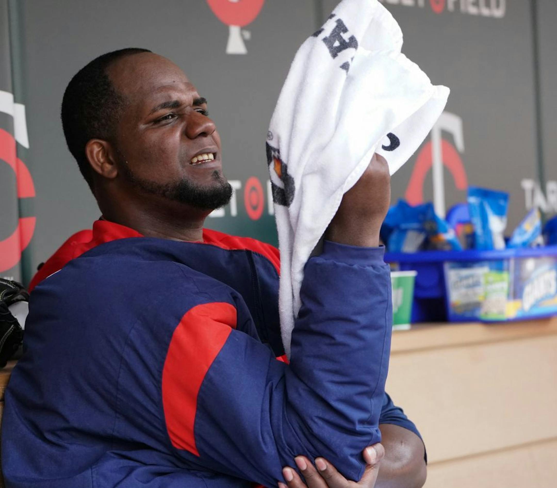 Minnesota Twins starting pitcher Michael Pineda (35) kept his arm loose in the dugout.
