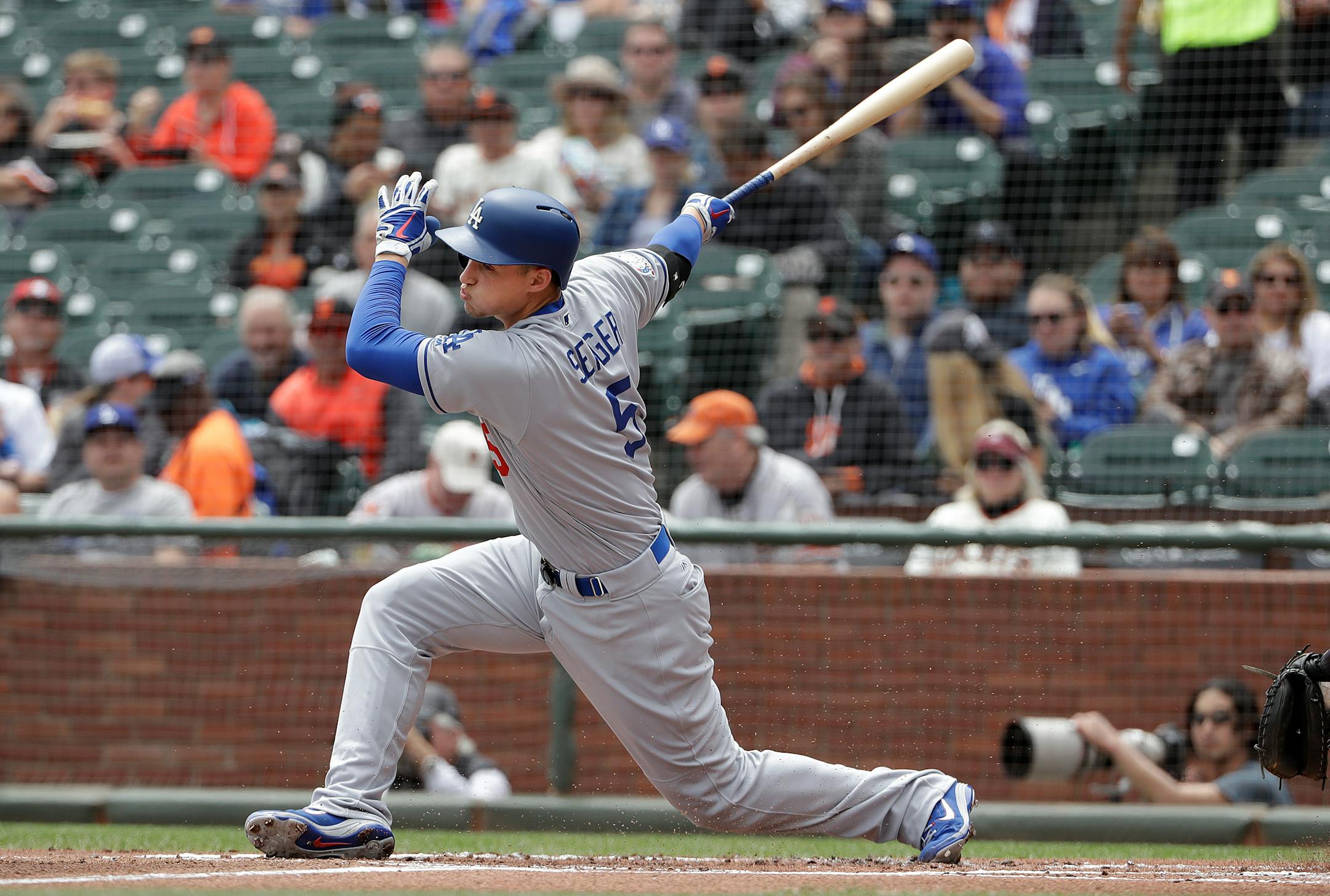 Los Angeles Dodgers' Corey Seager bats against the San Francisco Giants during a baseball game in San Francisco, Saturday, April 28, 2018. (AP Photo/Jeff Chiu)