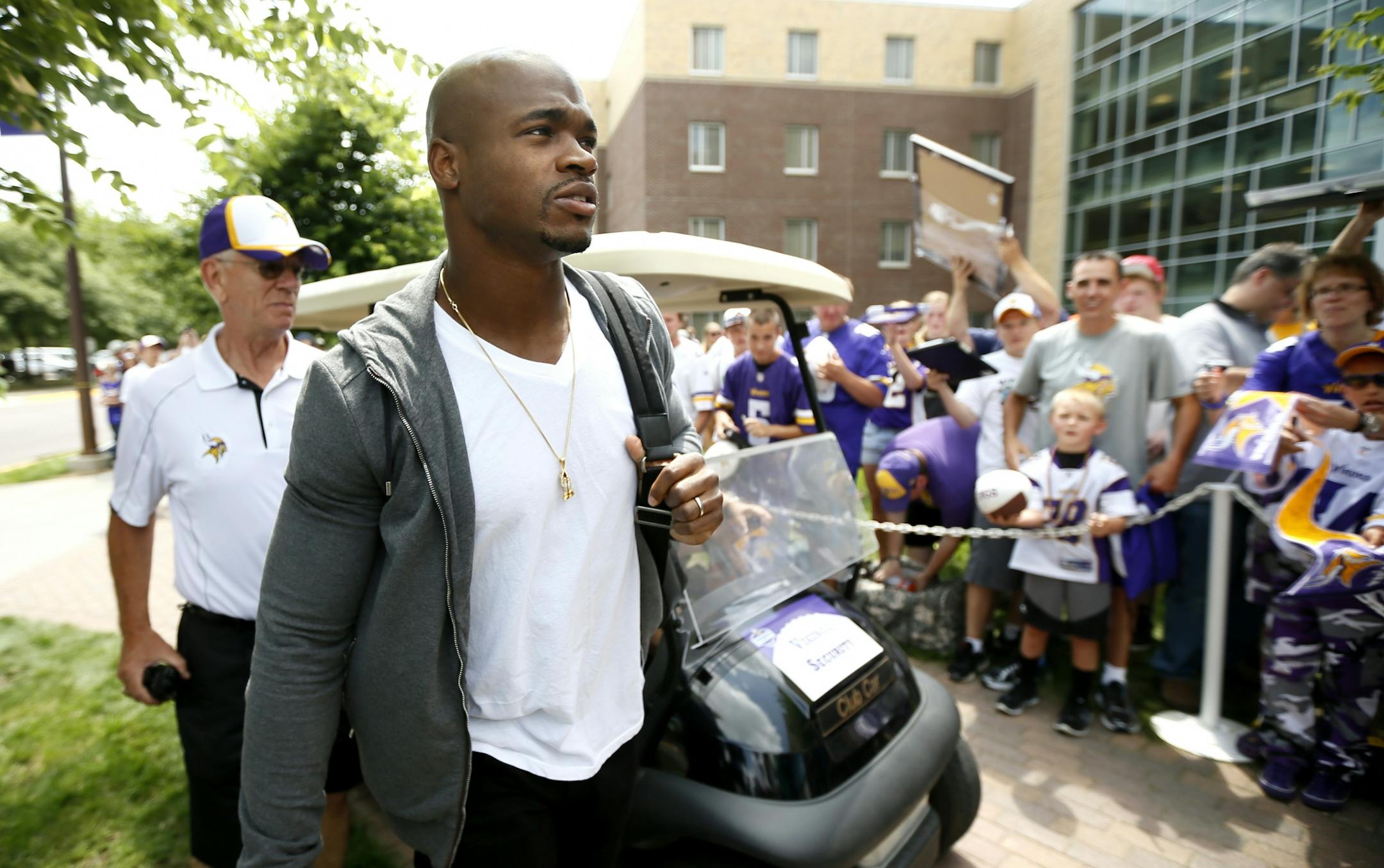 Vikings running back Adrian Peterson reported for camp in Mankato on Thursday.