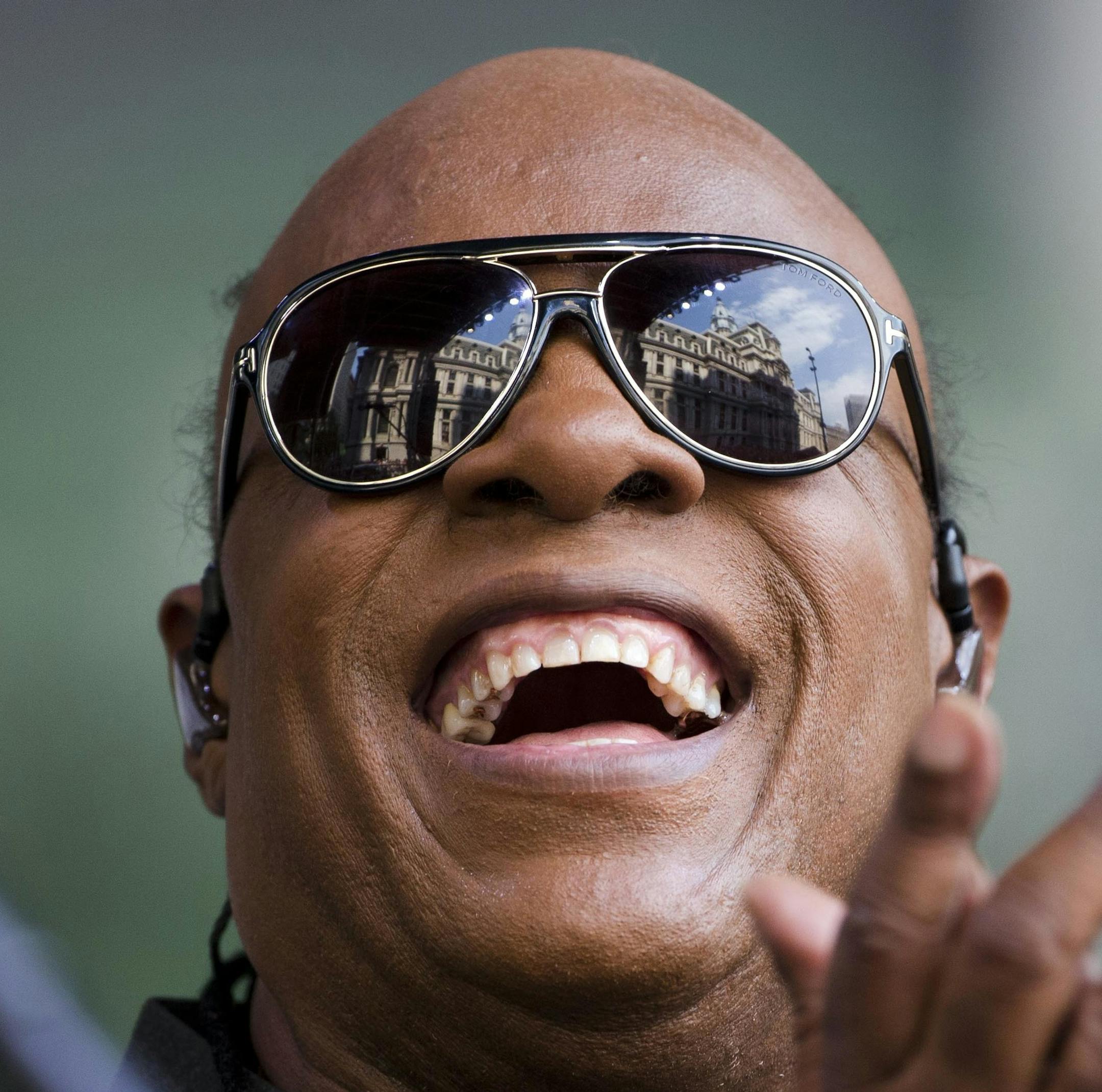 FILE - In this Aug. 17, 2015, file photo, musician Stevie Wonder performs during a free pop-up concert in Philadelphia. Stevie Wonder, Green Day, The Killers, The Lumineers and The Chainsmokers will perform at the Sept. 23, 2017, Global Citizen Festival, an annual free event held in New York’s Central Park. (AP Photo/Matt Rourke, File)