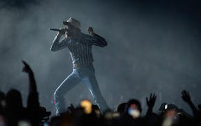 Post Malone performs during his set at U.S. Bank Stadium in Minneapolis on Tuesday.